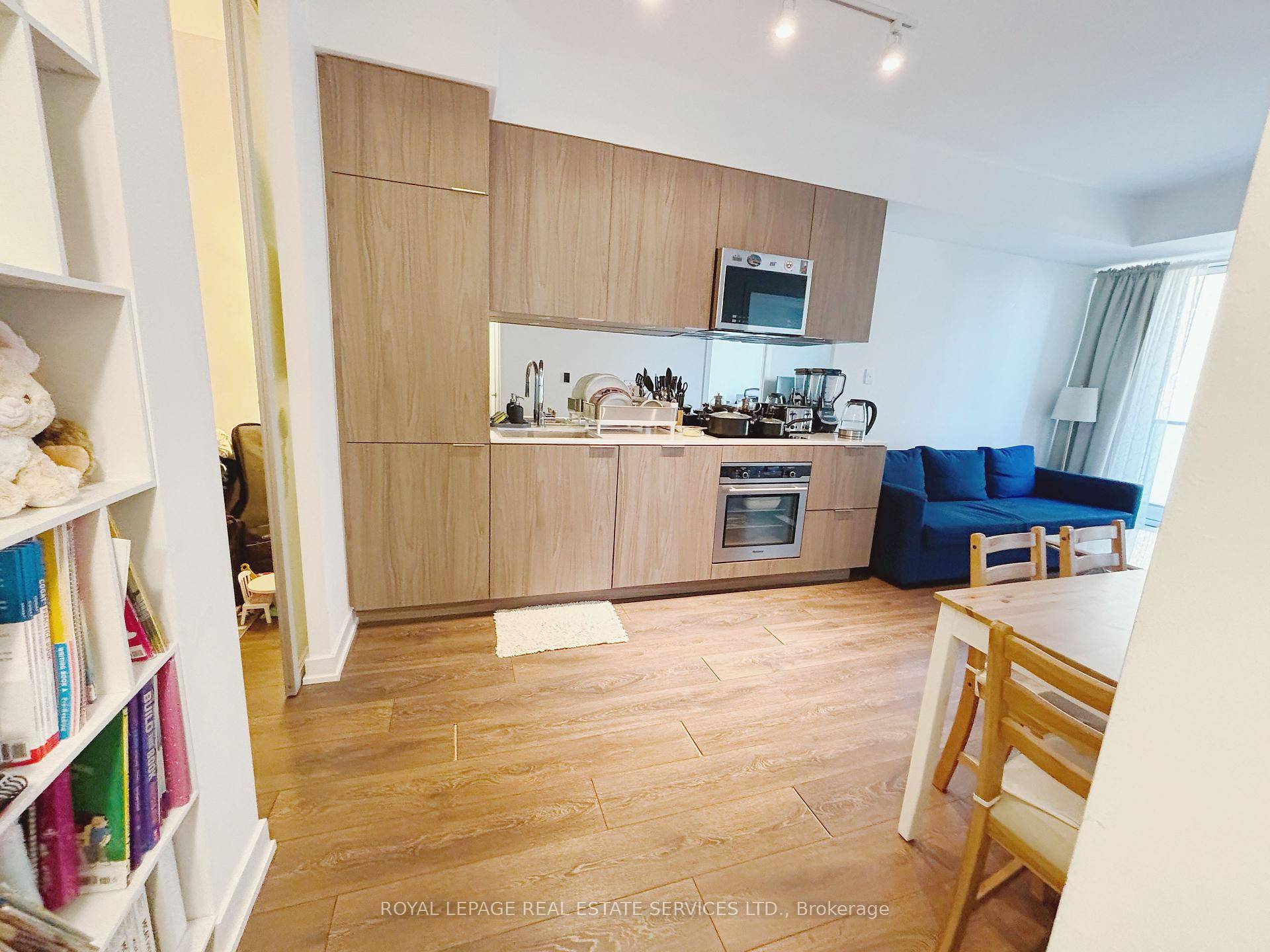 Open Concept Kitchen, 1 1 Bedroom With 2 Full Bathrooms, Den With Sliding Doors As 2nd Bedroom, Easily Convert To A Bedroom, Laminated Floor Throughout.