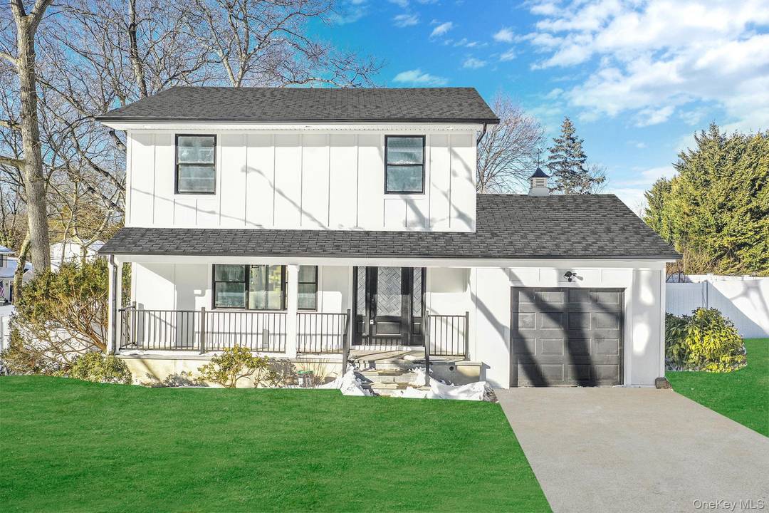 Welcome to this beautifully newly renovated Colonial in Half Hollow Hills school district, where classic charm meets modern upgrades.