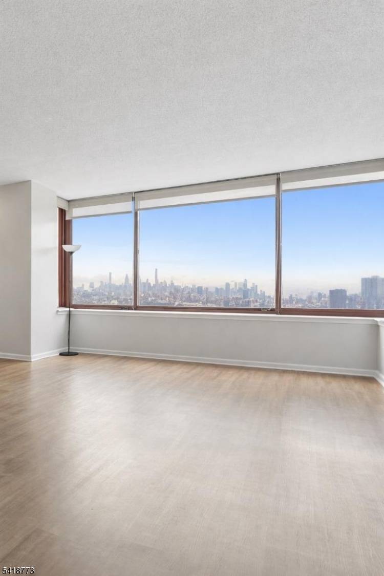 The Palisades. Corner unit with cross the hall way, walk down one floor to lobby, no waitng for elevator.