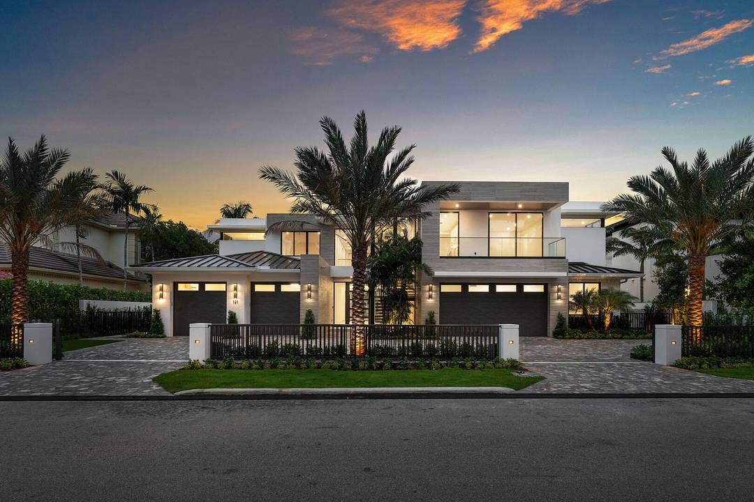 Experience unparalleled luxury in this brand new waterfront estate in the prestigious Royal Palm Yacht amp ; Country Club.