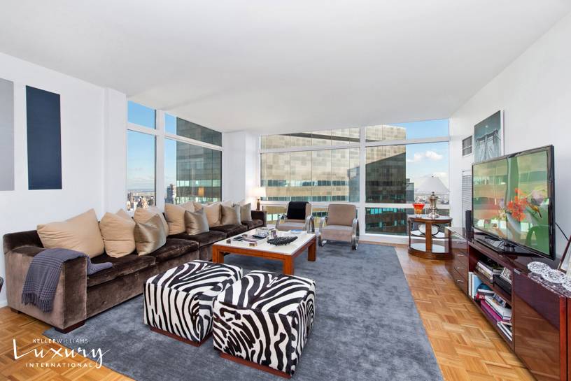 With walls opened and additional windows now revealed from floor to ceiling, this is a rare opportunity to acquire a luxurious 1, 138 sq.