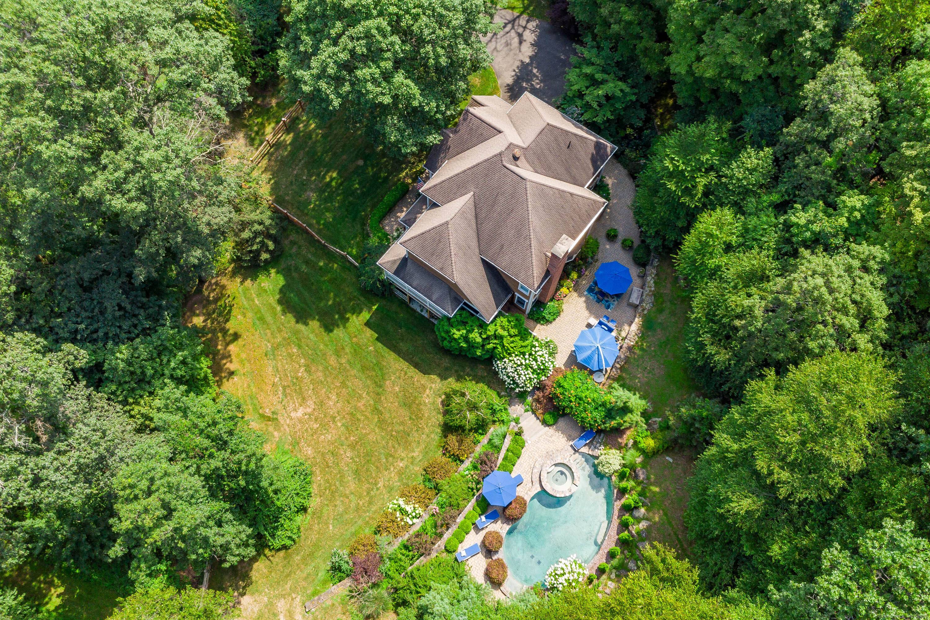 Tucked away on a private enclave of homes in desirable Southern Sherman, just minutes from the NY line, this stunning residence offers the perfect blend of seclusion, luxury and convenience ...