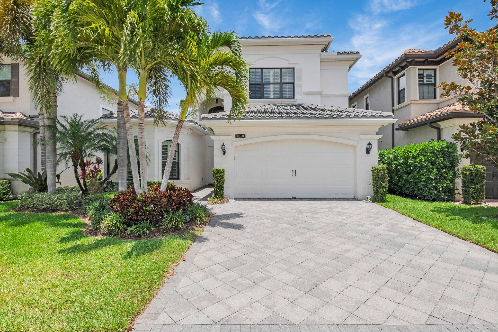 Rarely available lakefront Summit Grande with 1st floor primary suite and 3, 277 sqft of open living.