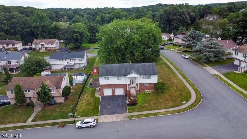 Tucked away on a quiet cul de sac, this spacious 4 bedroom, 2.