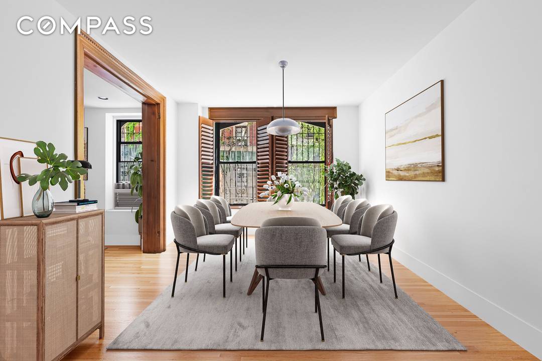 An expansive prewar duplex that lives like a townhouse, with four bedrooms, two full bathrooms and a powder room, a gracious separate dining room, and a private garden that brings ...