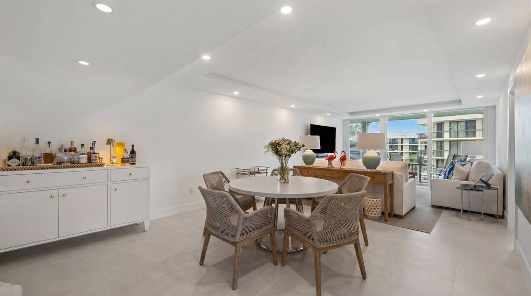 Beautifully and completely renovated 2BR 2BA corner unit at The Cove, showcasing sweeping Intracoastal views.