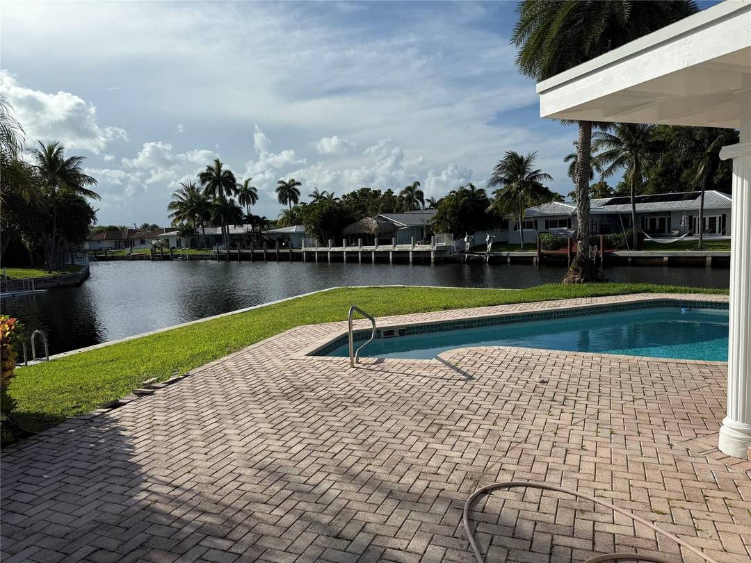 Discover your perfect coastal sanctuary in this unique 3 bedroom 3 bath home, situated on an expansive lot of 15207 sf with an impressive 265 of canal frontage.