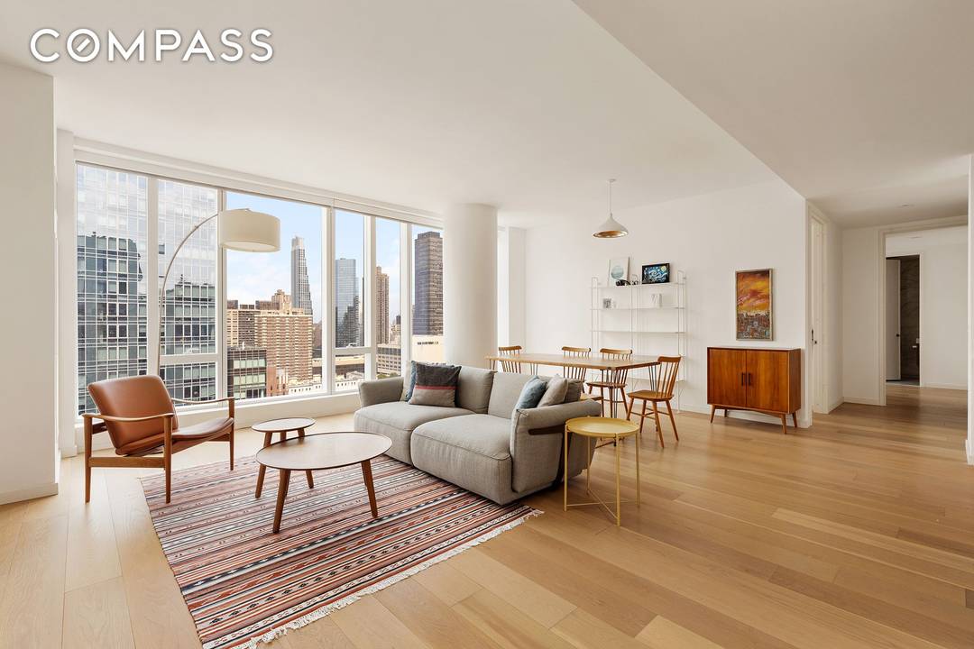 Welcome to Residence 22B a graciously proportioned 3 bedroom, 3 bathroom home offering 1, 687 square feet of beautifully finished interiors.