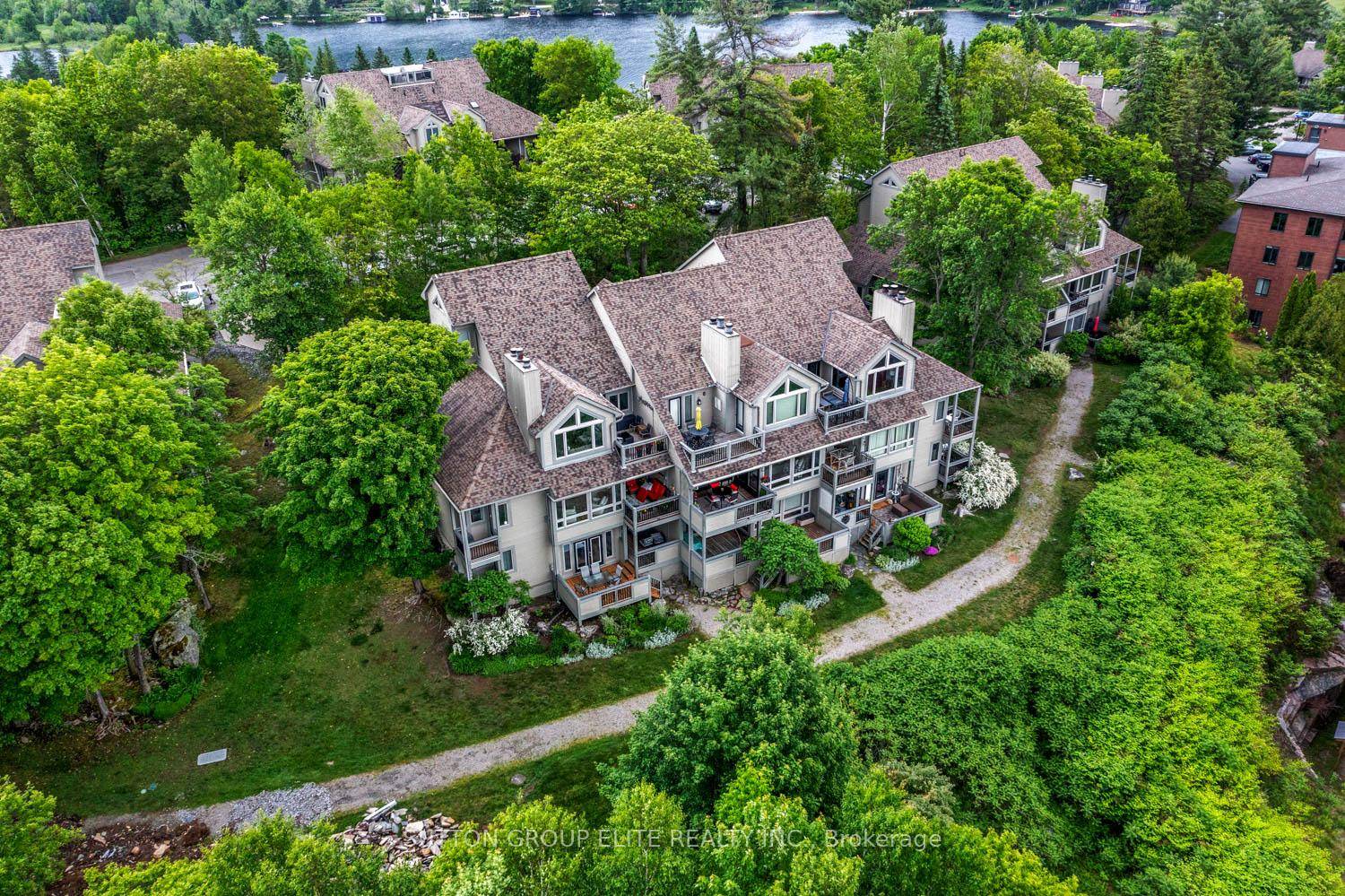 Welcome to 1611 Grandview Hilltop Drive Unit 16, a rare opportunity to own a charming FULLY RENOVATED lakeside condo on the shores of Fairy Lake in Huntsville, Muskoka.