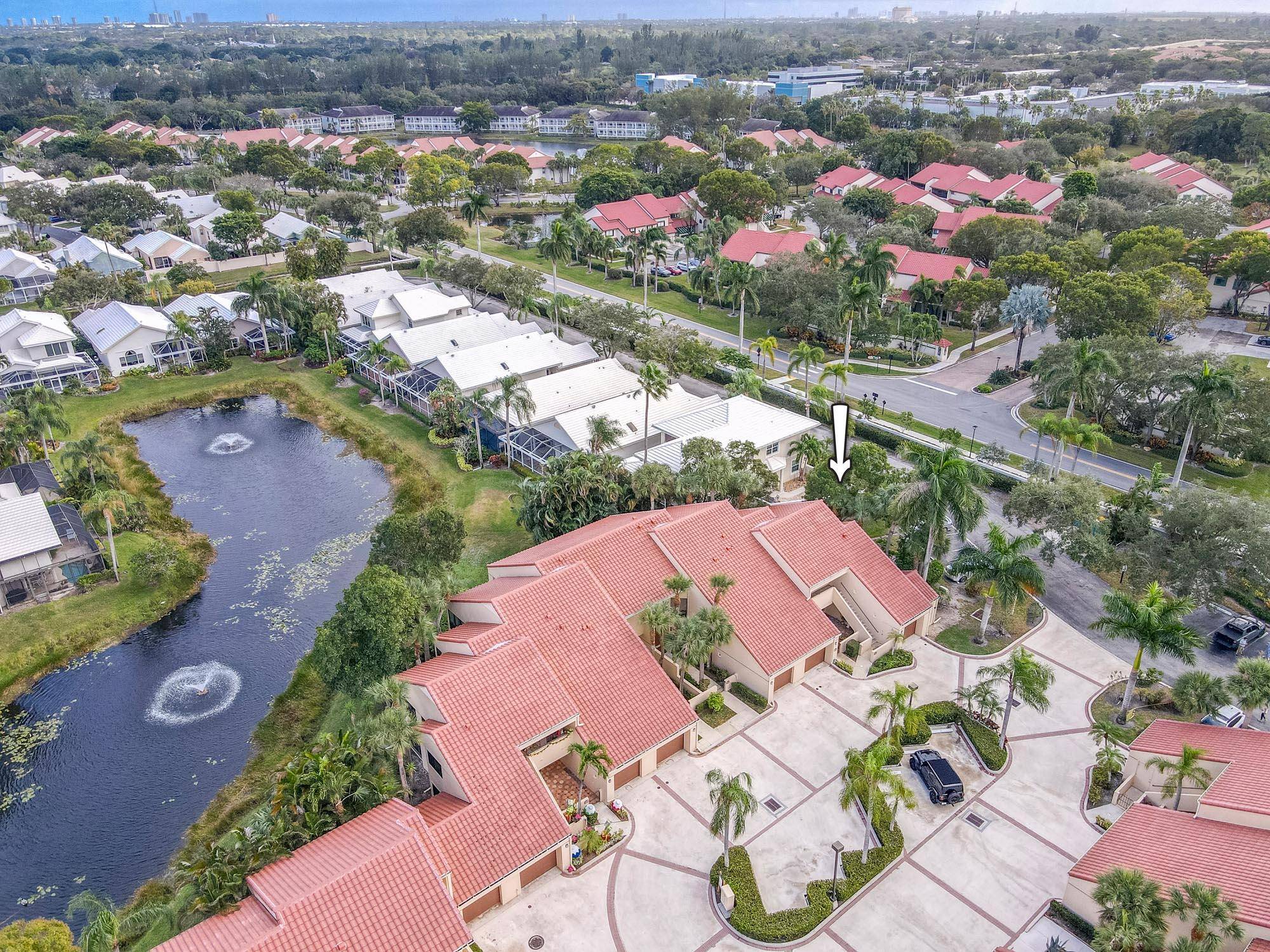 Bright and spacious 2 bedroom, 2 bathroom end unit condo with a brand new roof, located in the highly desirable PGA National community.