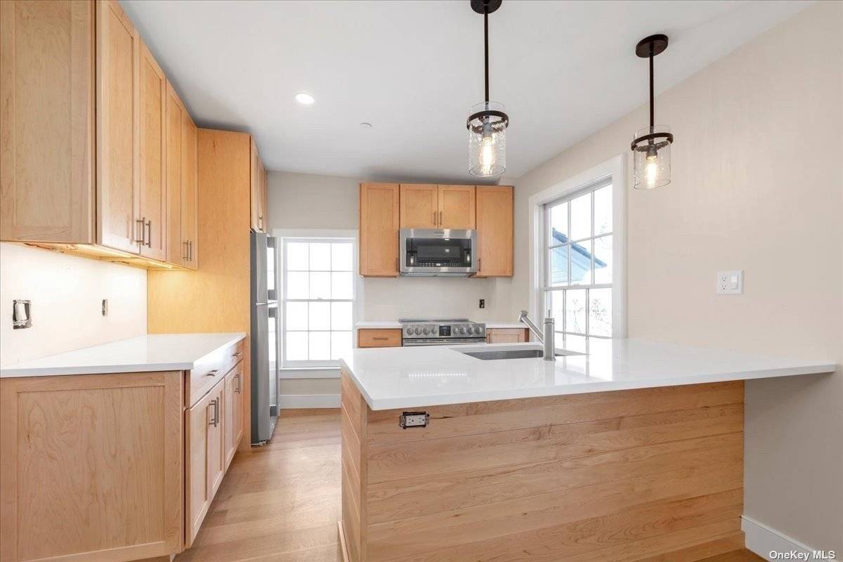 Bright and airy, all newly gut renovated luxury apartment in 5 unit historic Snouders building in downtown Oyster Bay.