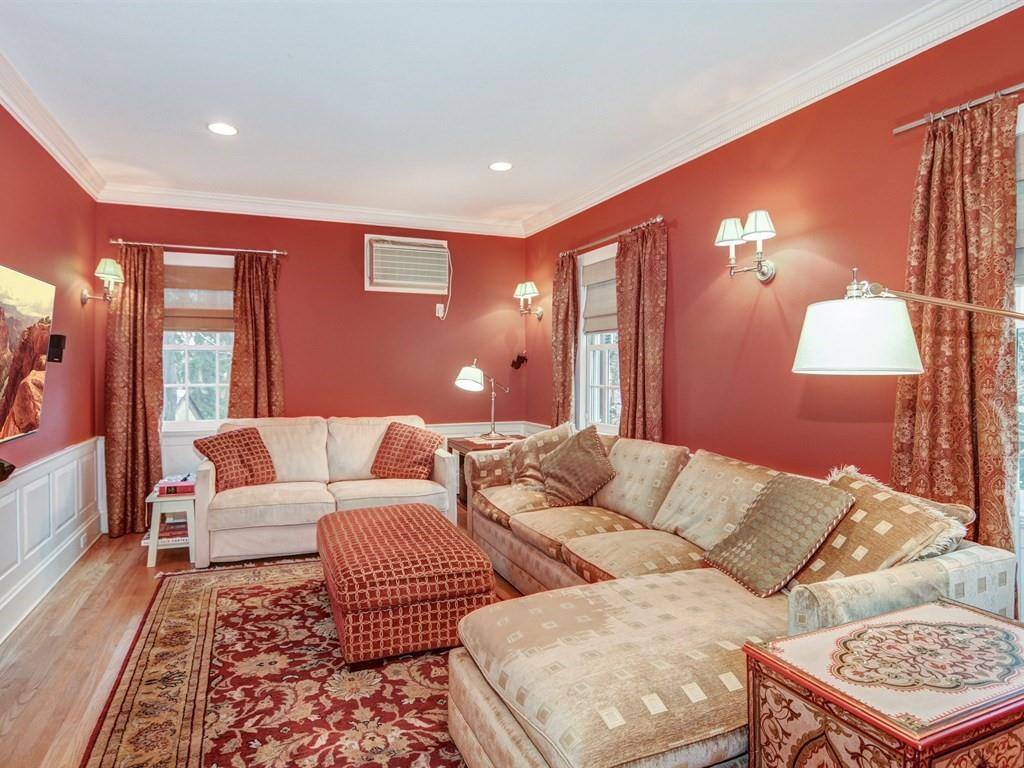 Dramatic colonial on corner lot, once the home of architect Dwight J.