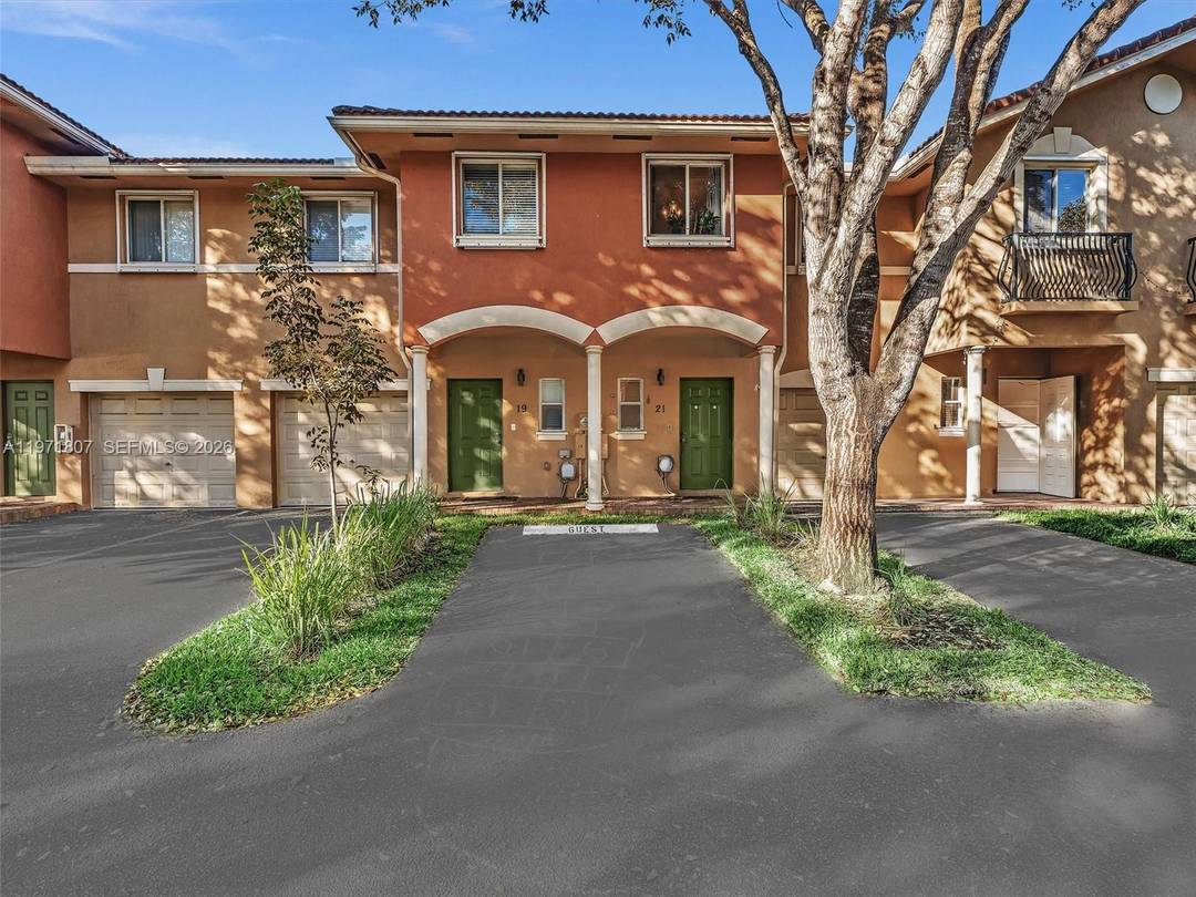 Beautiful 3BR 2BA townhouse featuring a bright, open floor plan with spacious living and dining areas.