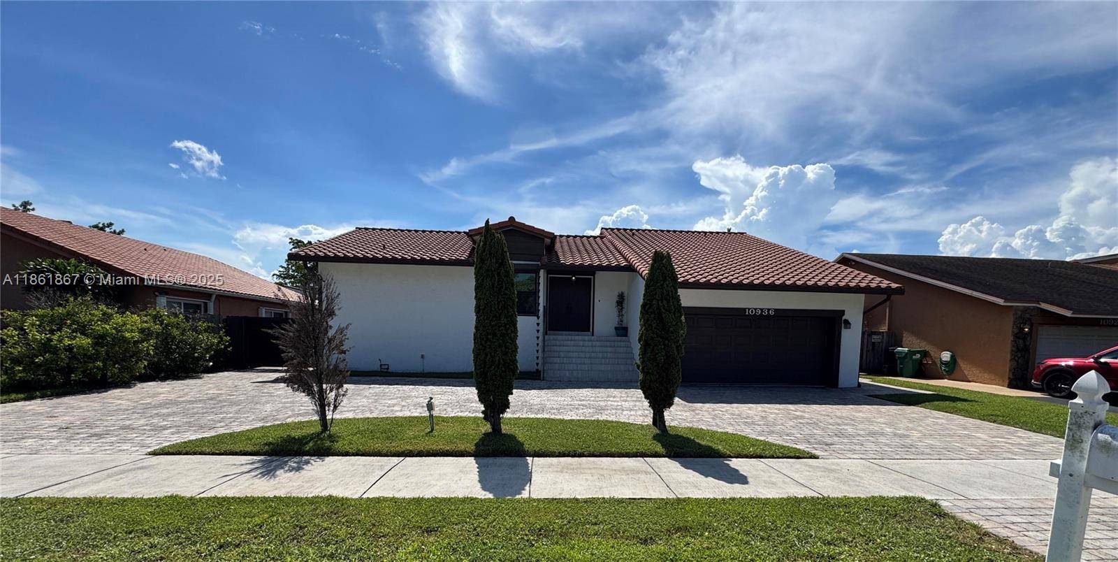 Welcome to 10936 SW 138th Pl, a charming large tri level POOL home in Miami, FL 33186.