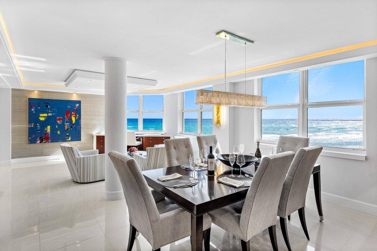 Coastal luxury awaits in this magnificent corner residence, boasting breathtaking, unobstructed panoramic ocean views.