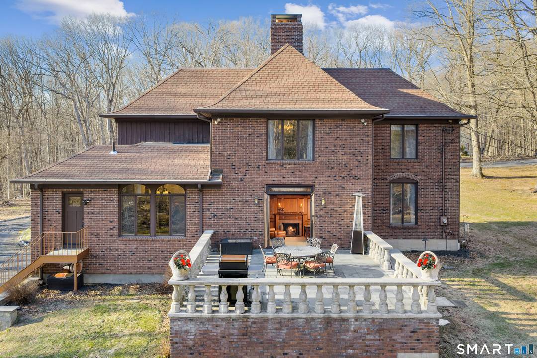 Evoking the timeless elegance of Newport's grand estates, this charming 'Baby Breakers' style all brick residence blends classic architecture with refined detailing and a stunning Newport style terrace perfect for ...