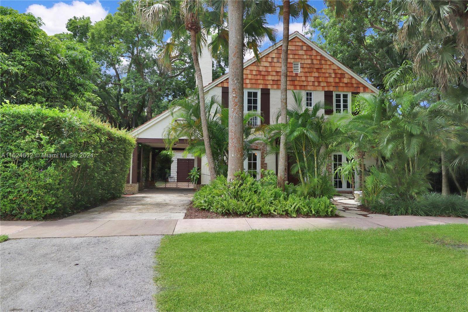 Step into history with this enchanting 1926 landmark gingerbread home, your gateway to the coveted Gables lifestyle.