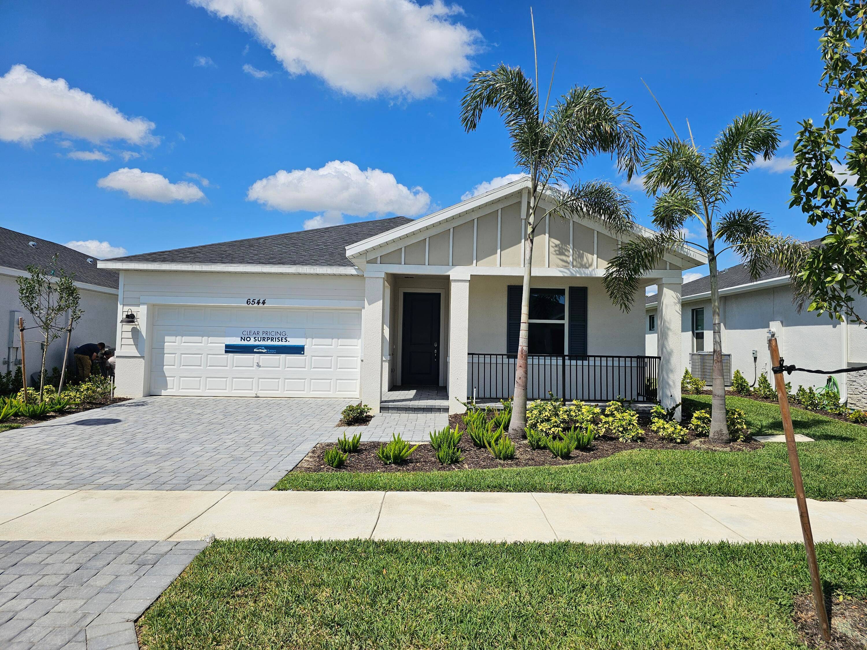This stunning, new construction resale home, built in 2023, is located in the desirable Brystol at Wylder community, adjacent to Glylea Country Club.
