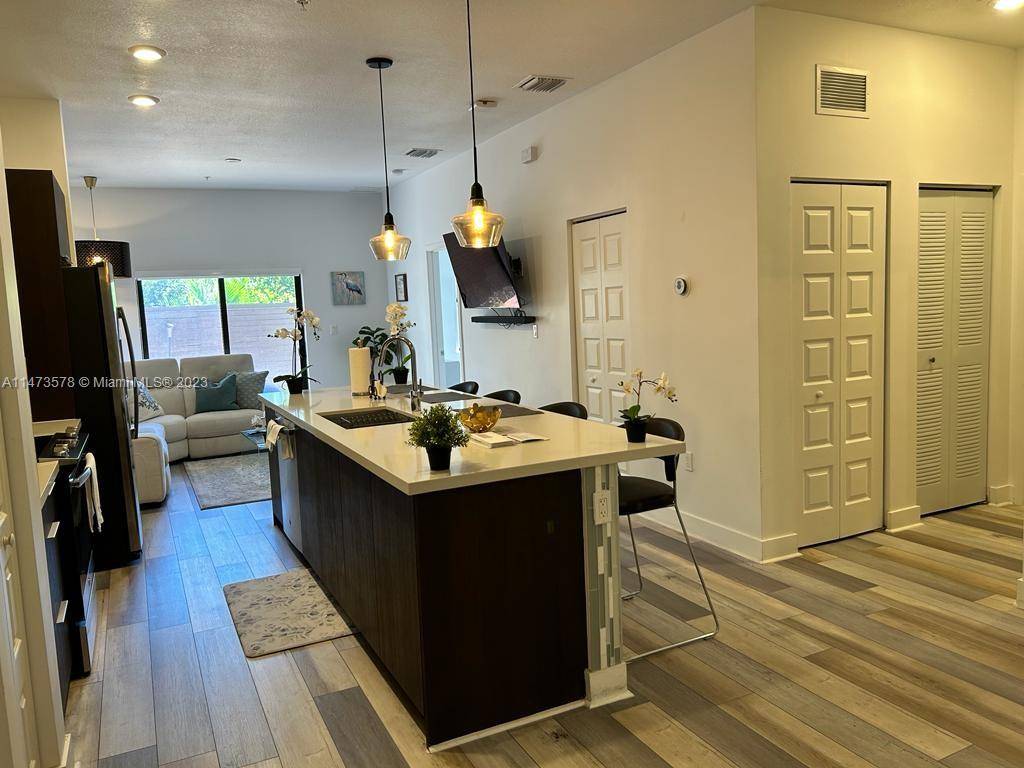 WONDERFUL BRAND NEW Unit in APEX AT PARK CENTRAL, offers a charming and comfortable open design that combines kitchen, dining and family room in a cozy space complemented by a ...