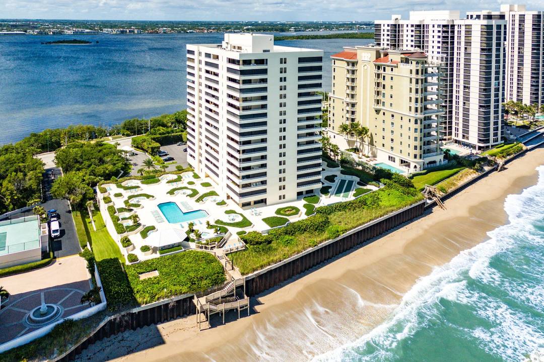 DIRECT OCEANFRONT LUXURY CONDO LIVING ON SINGER ISLANDEXPERIENCE OCEAN AND INTRACOASTAL VIEWS from this fully remodeled corner unit, 2 bed 2 bath residence with over 1, 600 sqft !