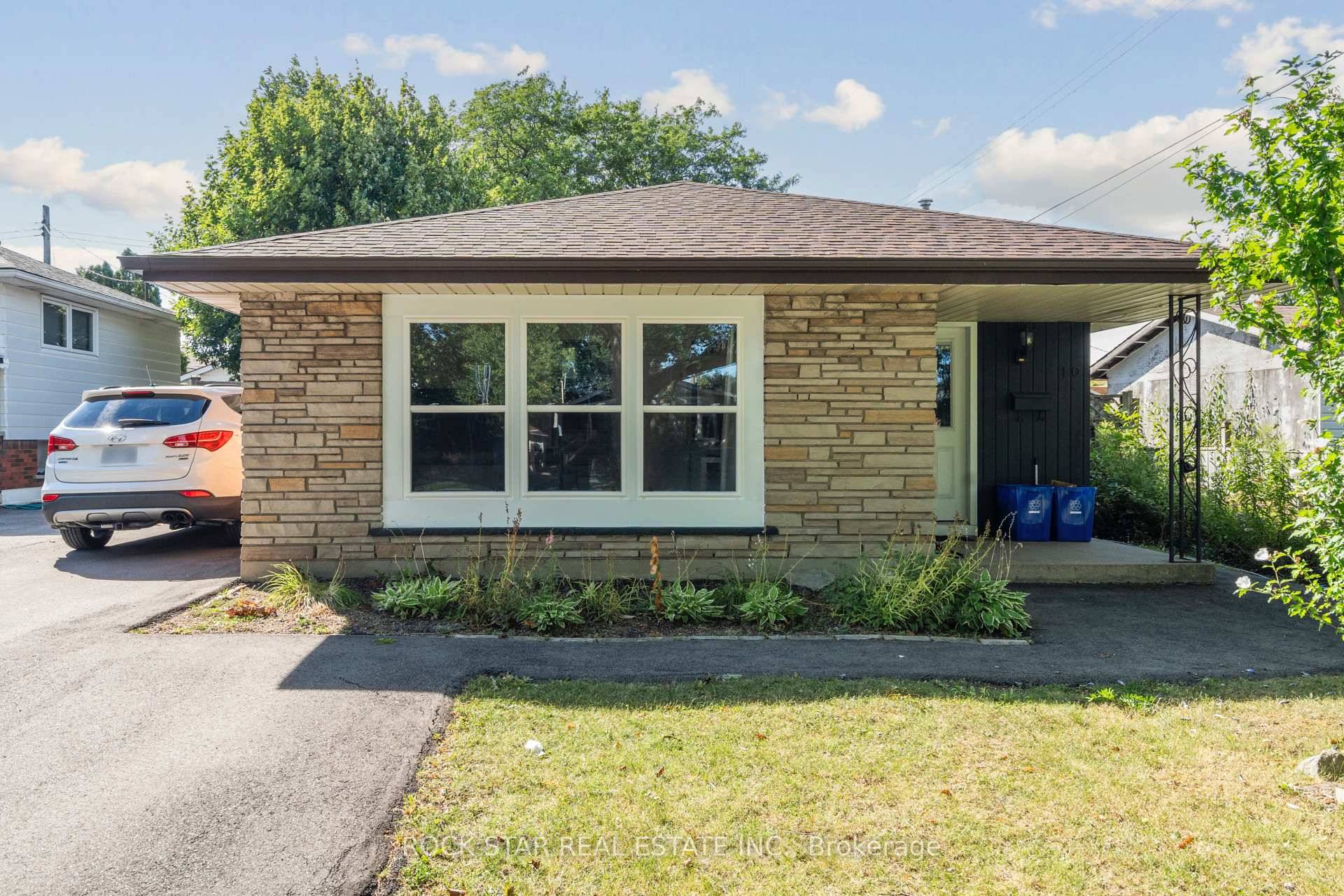 This beautifully rebuilt and redesigned legal two family home completed in 2024 is located in the highly sought after Hamilton Mountain community.