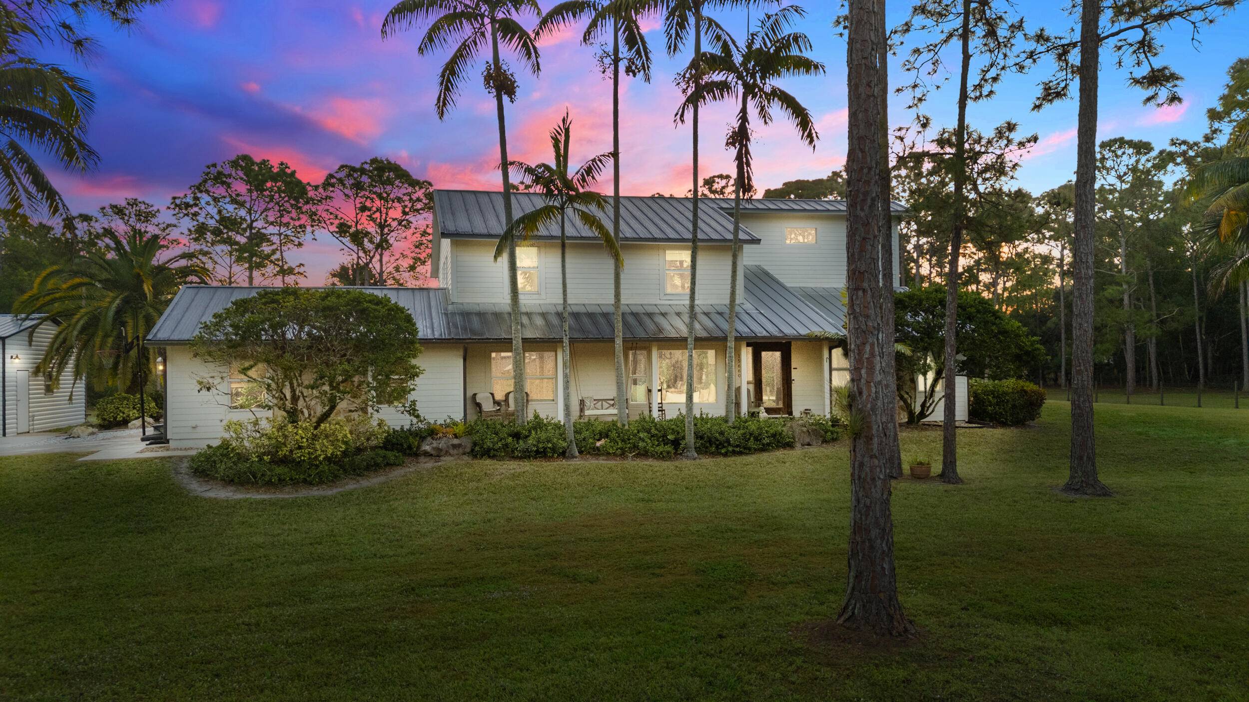 Spanning 2. 5 acres of pristine landscape, this private sanctuary defines holistic luxury living with a seamless blend of nature, tranquility, and refined design by Tiffany Lynn Interiors.