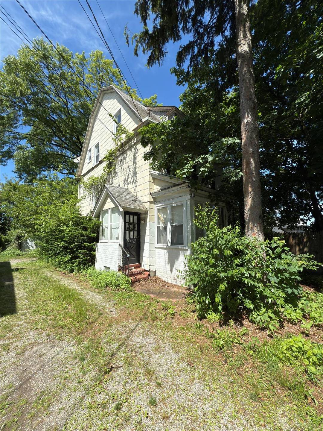 Two family home situated on a large lot.