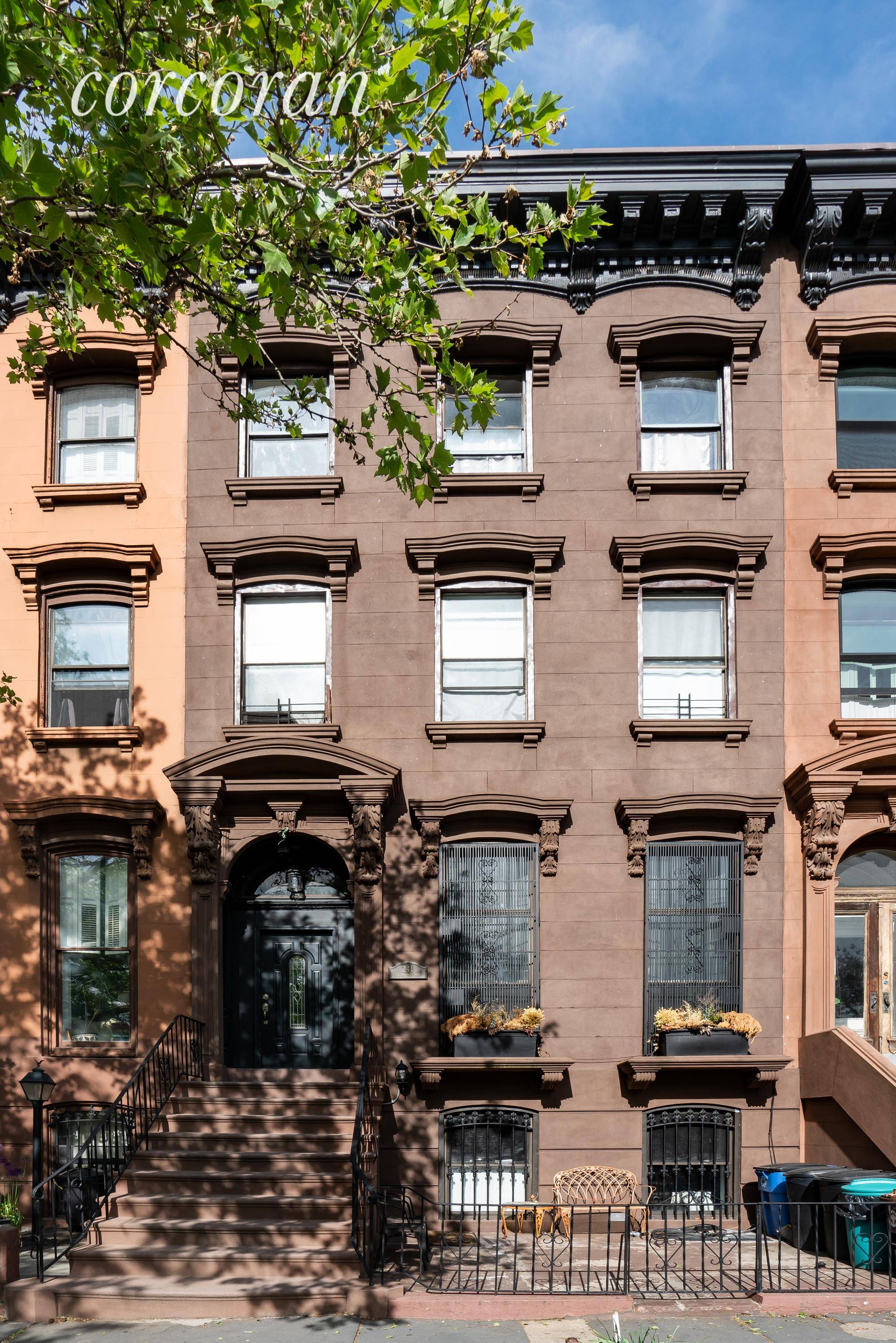Massive 3, 960 square foot historic Brownstone on a gorgeous tree lined street with additional full finished basement !