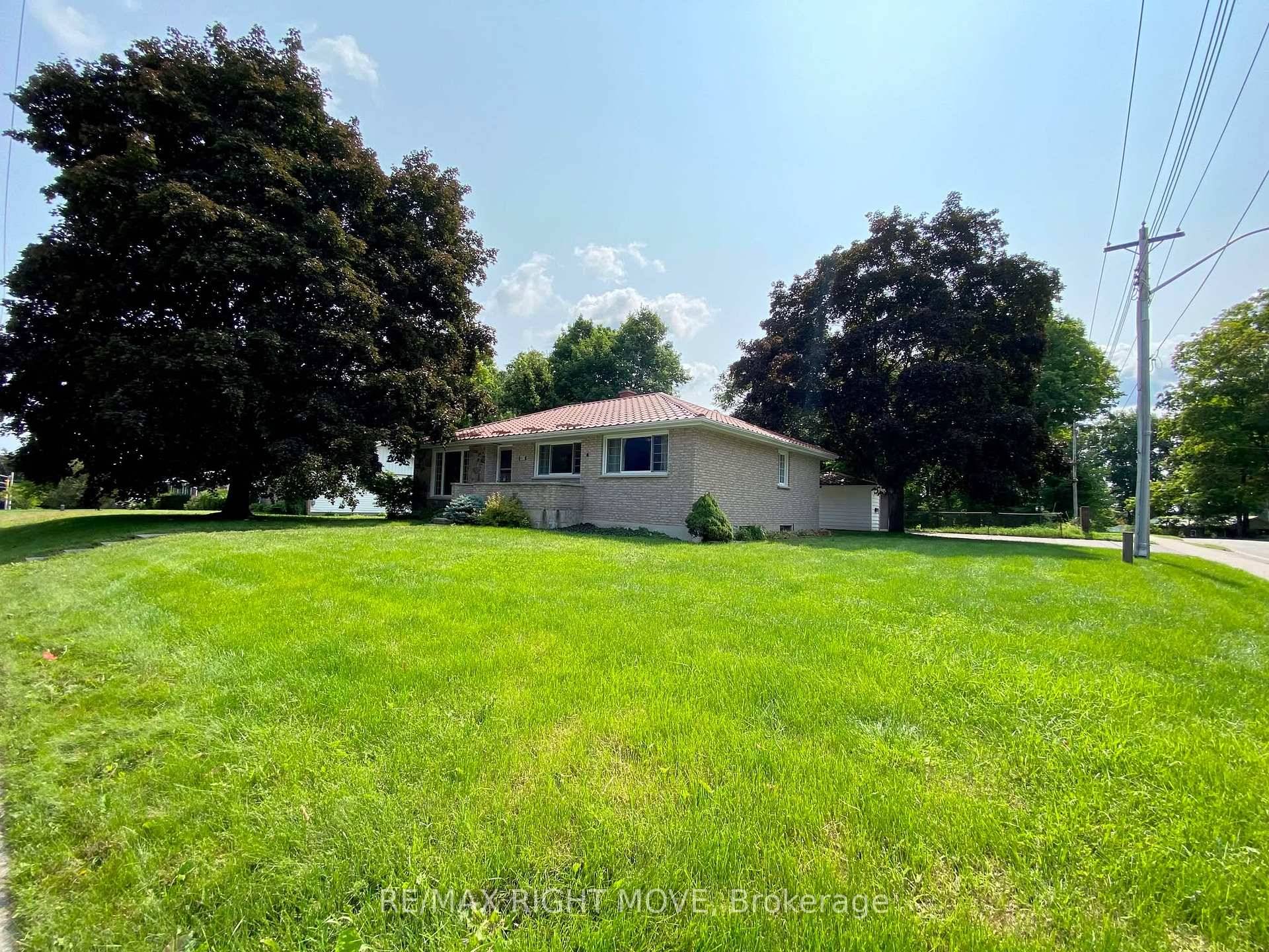 All brick bungalow with huge potential on an oversized lot.