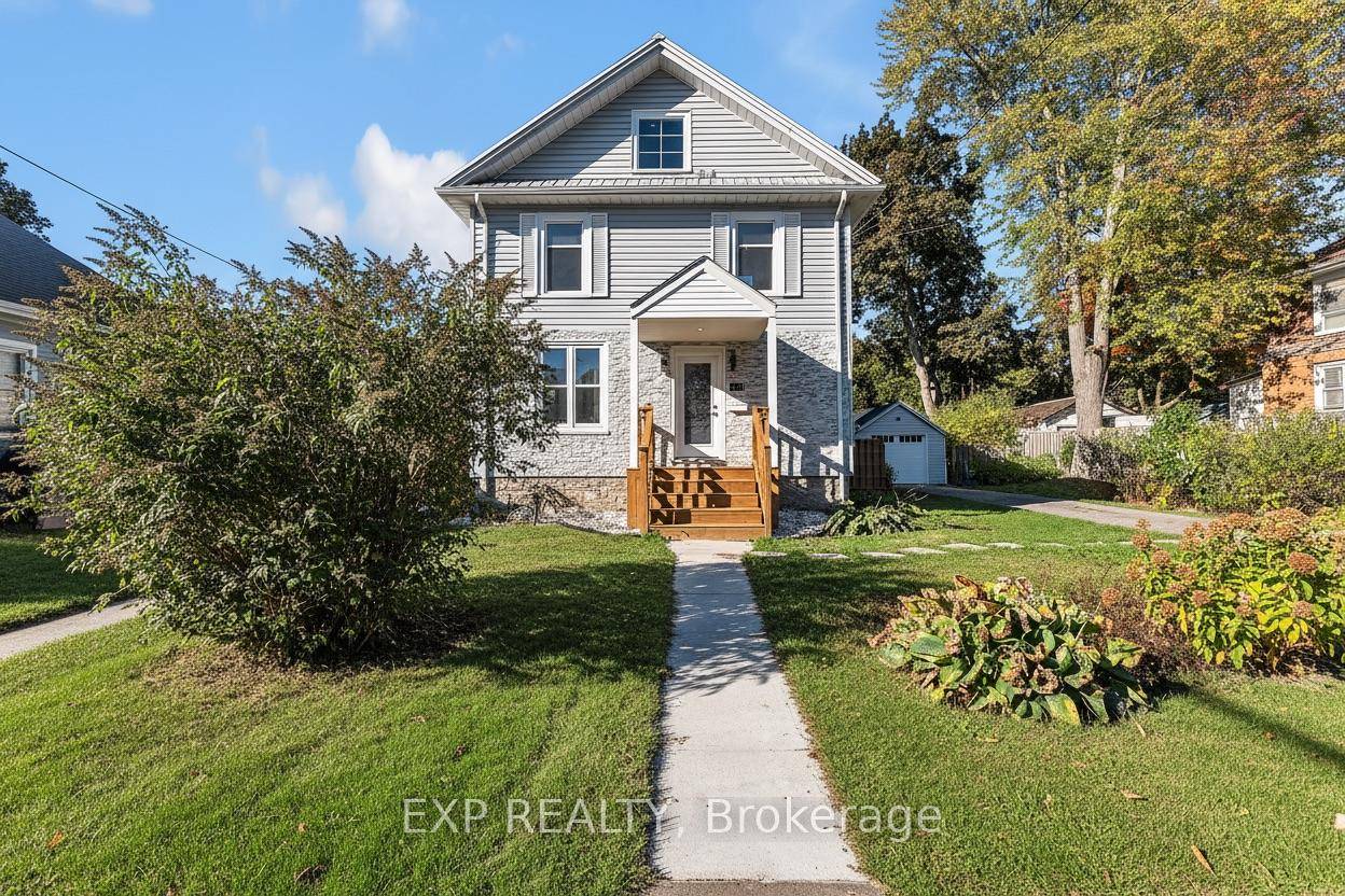 A century home completely reimagined in Bellevilles prestigious Old East Hill.
