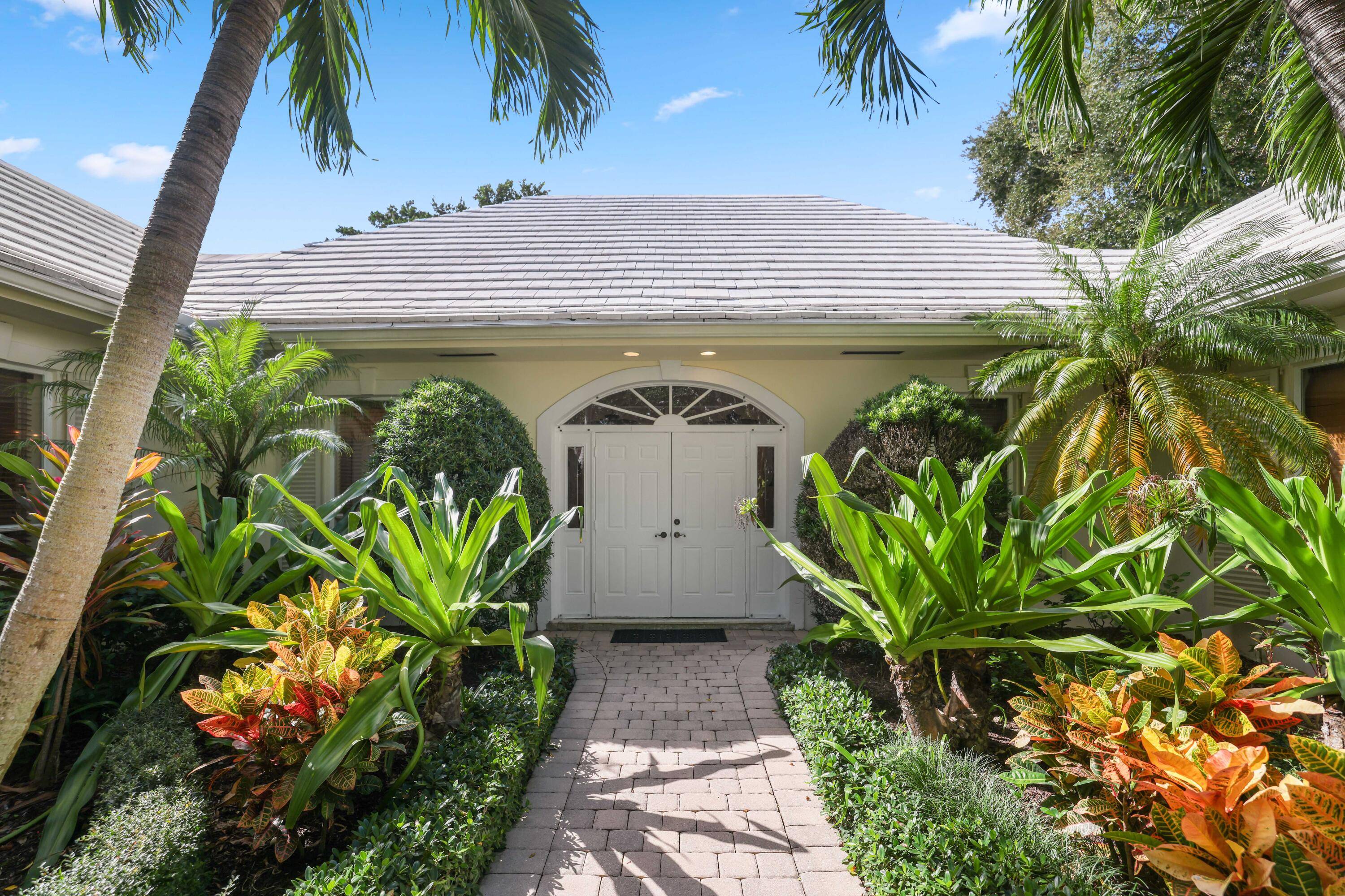 Nestled within the serene and exclusive Village of Golf community, this unique property offers elegant living, unparalleled views of the idyllic pond and golf course, with exceptional privacy on an ...