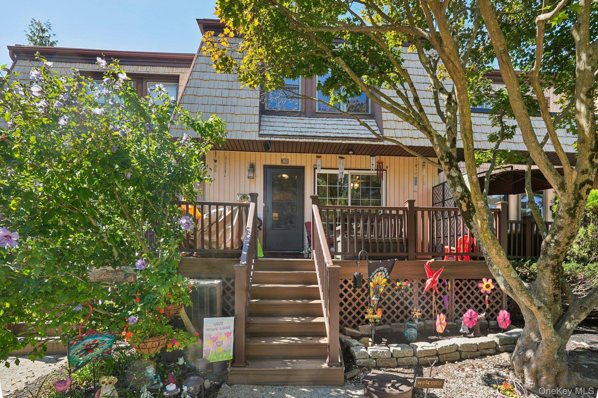 Welcome to this beautifully updated, spacious two bedroom, two and a half bath townhouse on three levels.