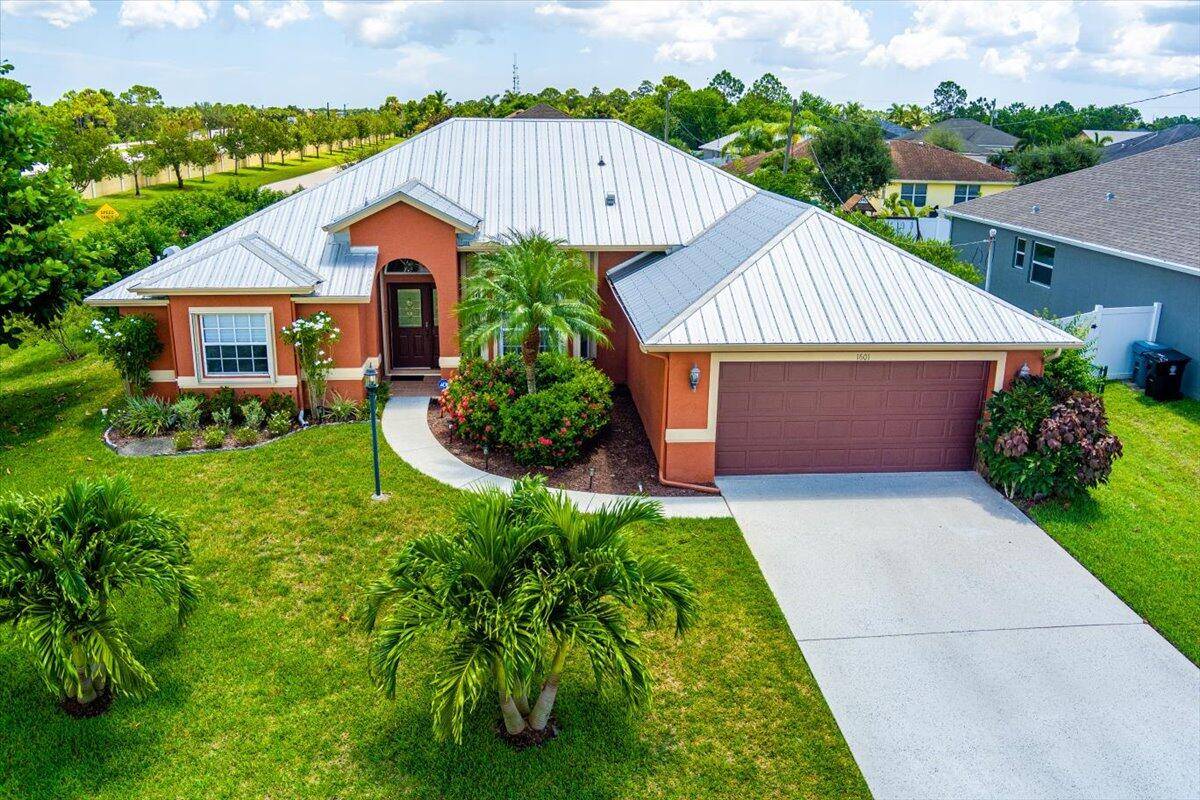 Beautiful 3BR Den, 2BA pool home on an oversized corner lot just minutes from Tradition, with NO HOA !