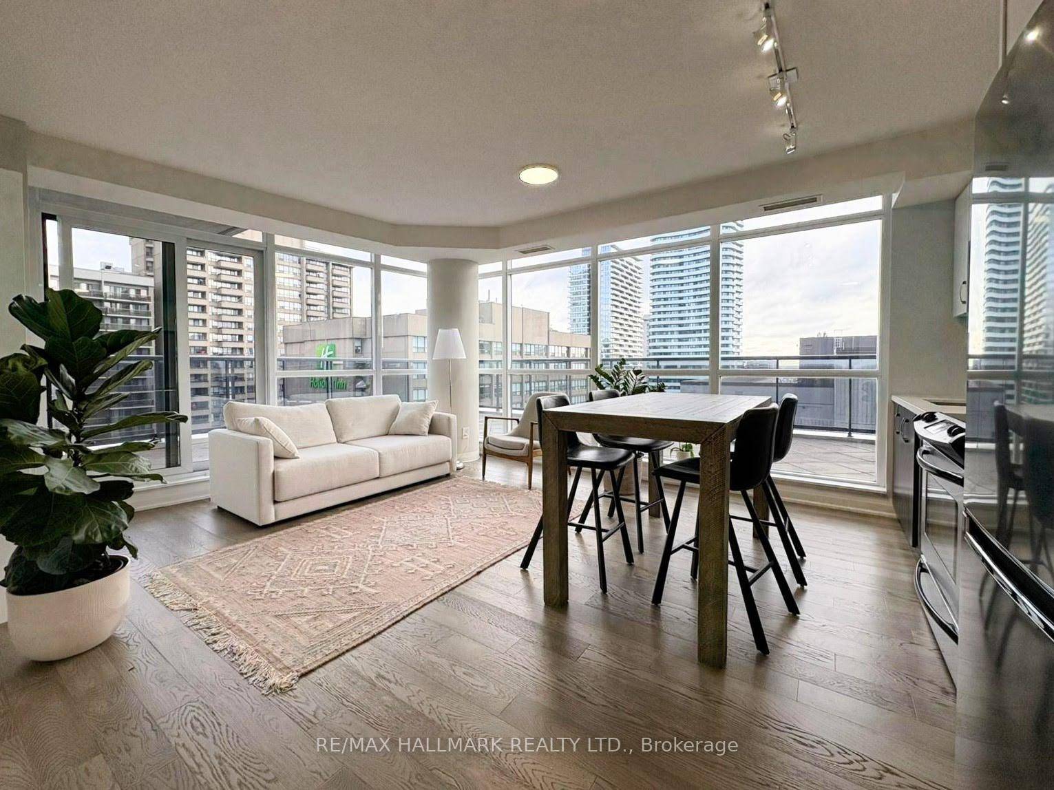Bright Downtown Toronto Corner Condo with Oversized Terrace Welcome to 25 Carlton St.