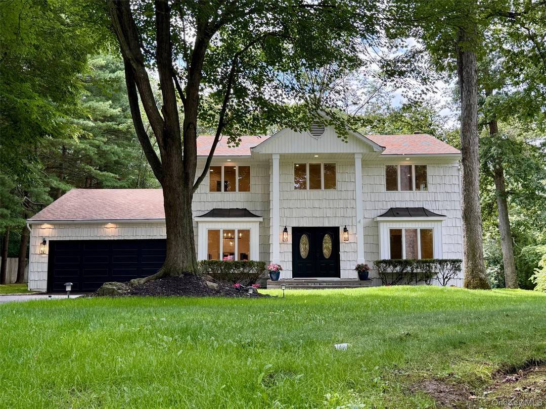 This newly renovated 5 bedroom Center Hall Colonial is situated on a private cul de sac within the highly regarded Half Hollow Hills School District.