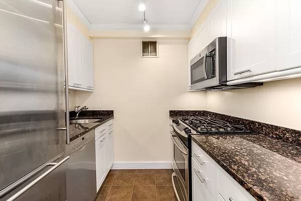 Top floor privacy, custom built ins throughout, and a nearly 24 foot primary bedroom make this beautifully renovated two bedroom home a rare find in Battery Park City.