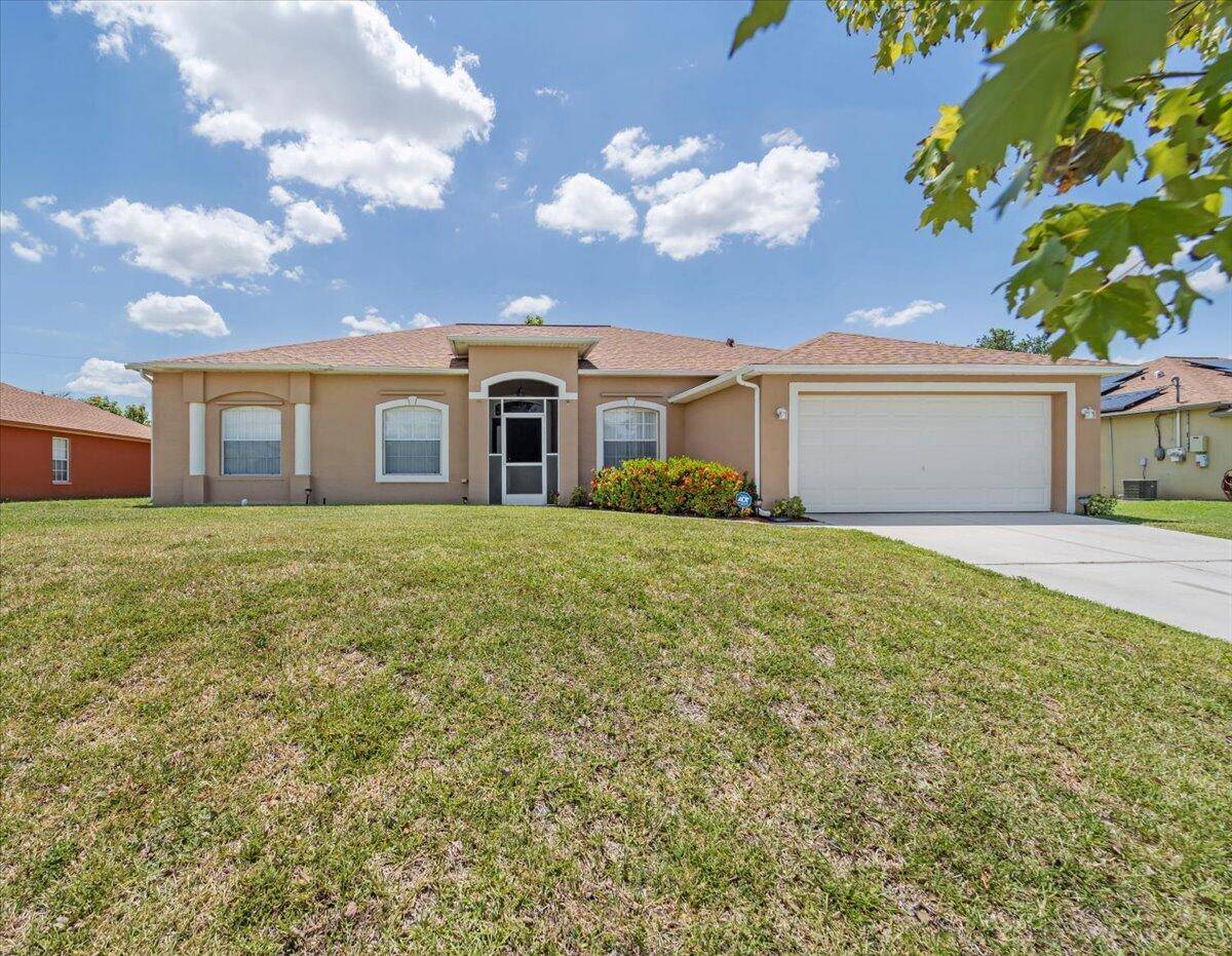 This home boasts 3 bedrooms, 2 bathrooms, den, formal living, dining room and a 2 car garage, on a double lot, providing space for you and your family.