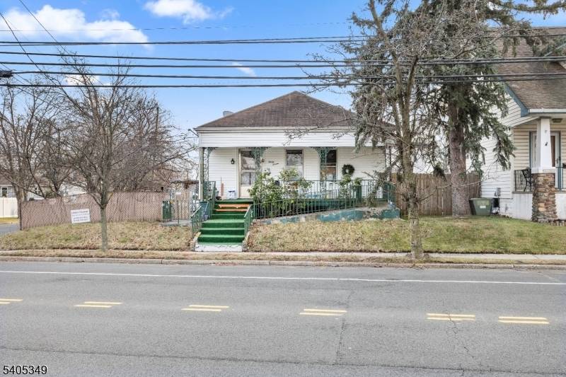 Situated on a corner lot in Linden, this single family home offers space, flexibility, and excellent location convenience.