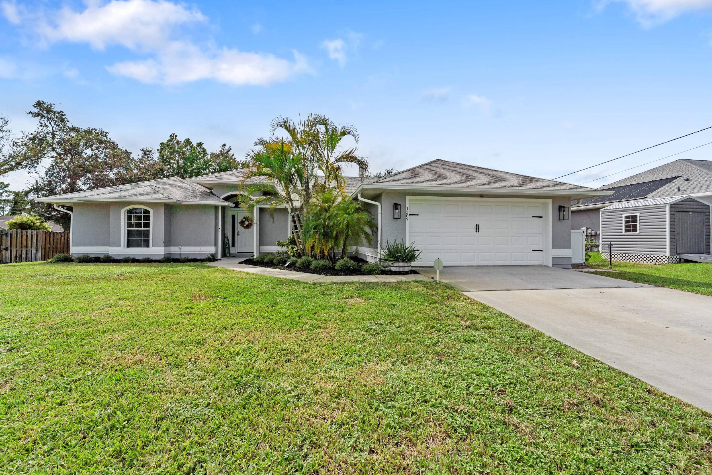 Updated 4 bedroom, 2 bathroom home with over 2, 220 sq ft of living space plus a 400 sq ft Florida room in the heart of Sebastian Highlands.