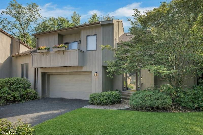 This amazingly spacious, bright, and open 3 bedroom, 2 1 2 bath end unit townhome is situated in one of the best locations in Spruce Edge !