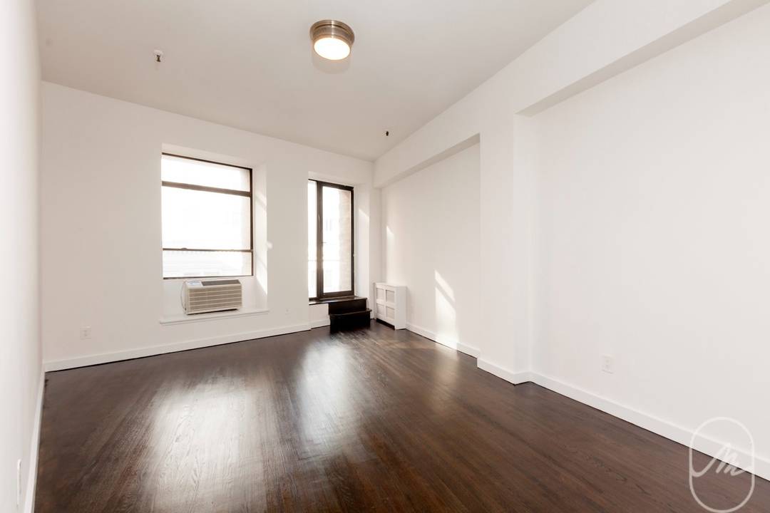 Fabulous new True North one bedroom with extra high ceilings, great natural light, a king sized bedroom, and a balcony with views of Union Square.