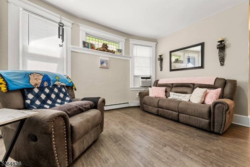 Welcome home to this exceptional three family located in one of Bloomfield's most desirable and commuter friendly neighborhoods just a 3 minute walk to the NYC bus and a 7 ...