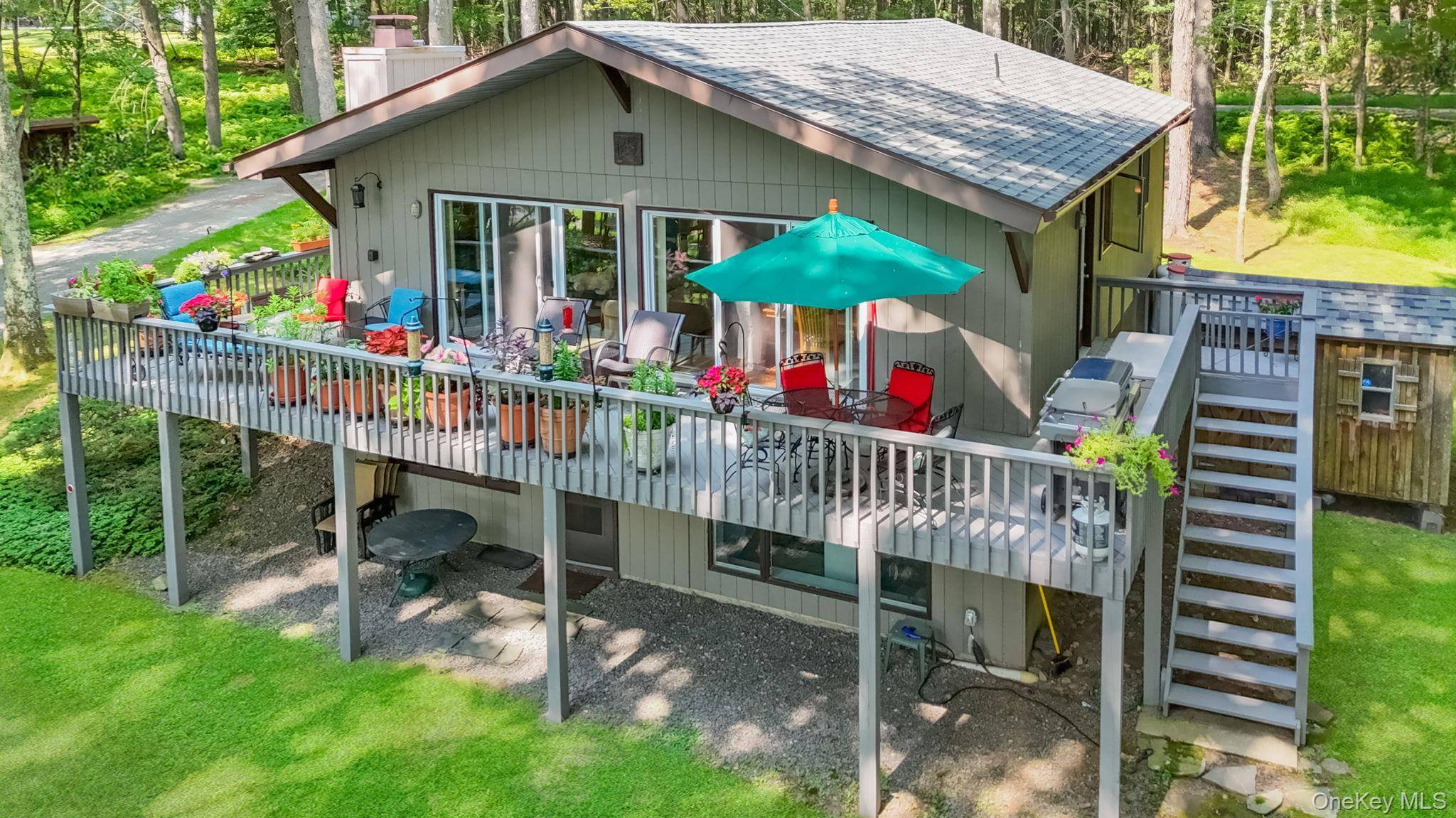 Situated on a pristine mountain lake this picture perfect home is waiting for you !