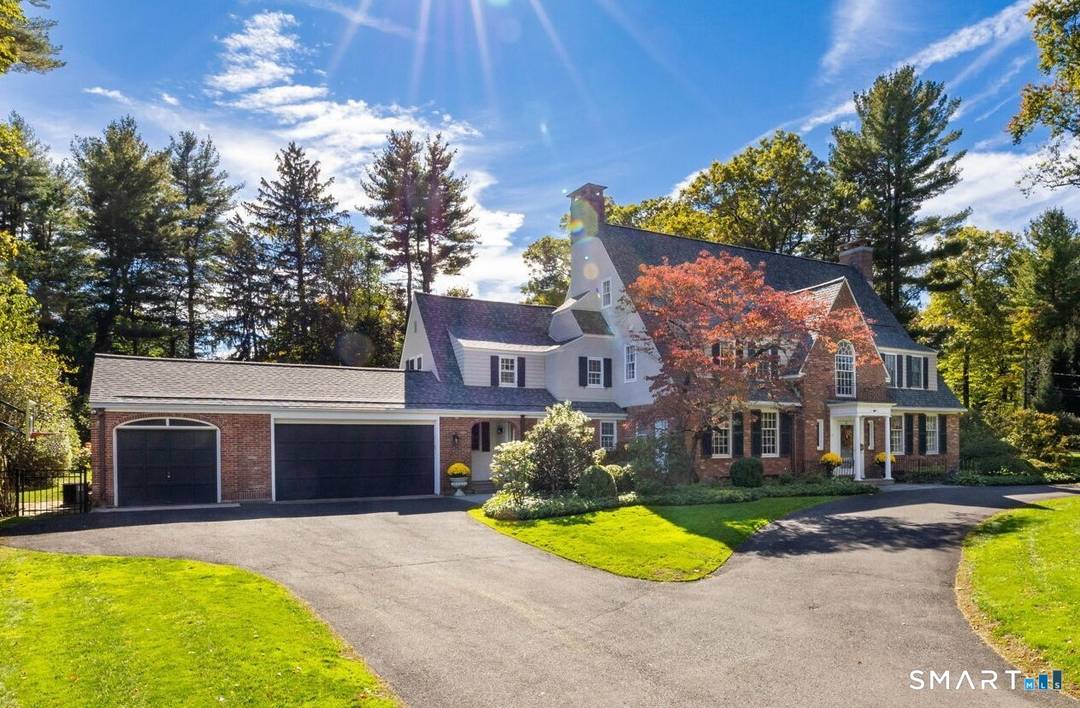 Spectacular 1924 brick Colonial tucked away on a private lane off Bloomfield Avenue.