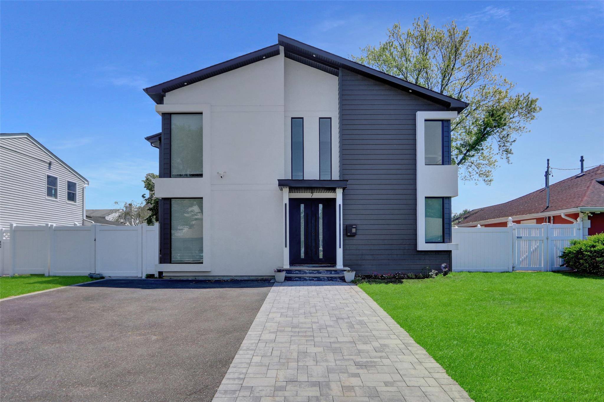 Welcome to Plainview s one of a kind home, an exceptional residence offering 5 spacious bedrooms and 4.