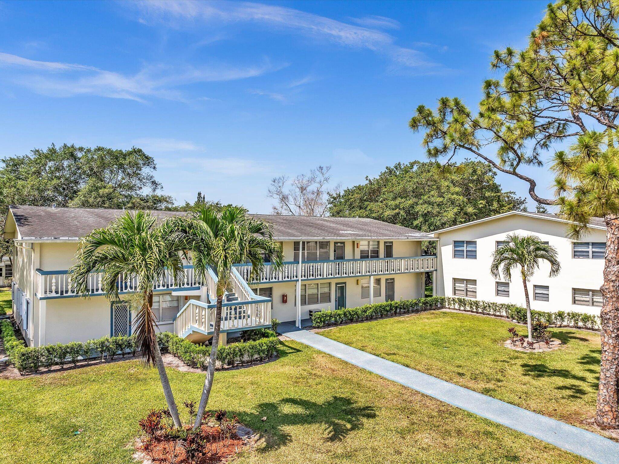 Discover effortless living in this move in ready 2nd floor condo nestled in the serene Tilford M section of Century Village East.