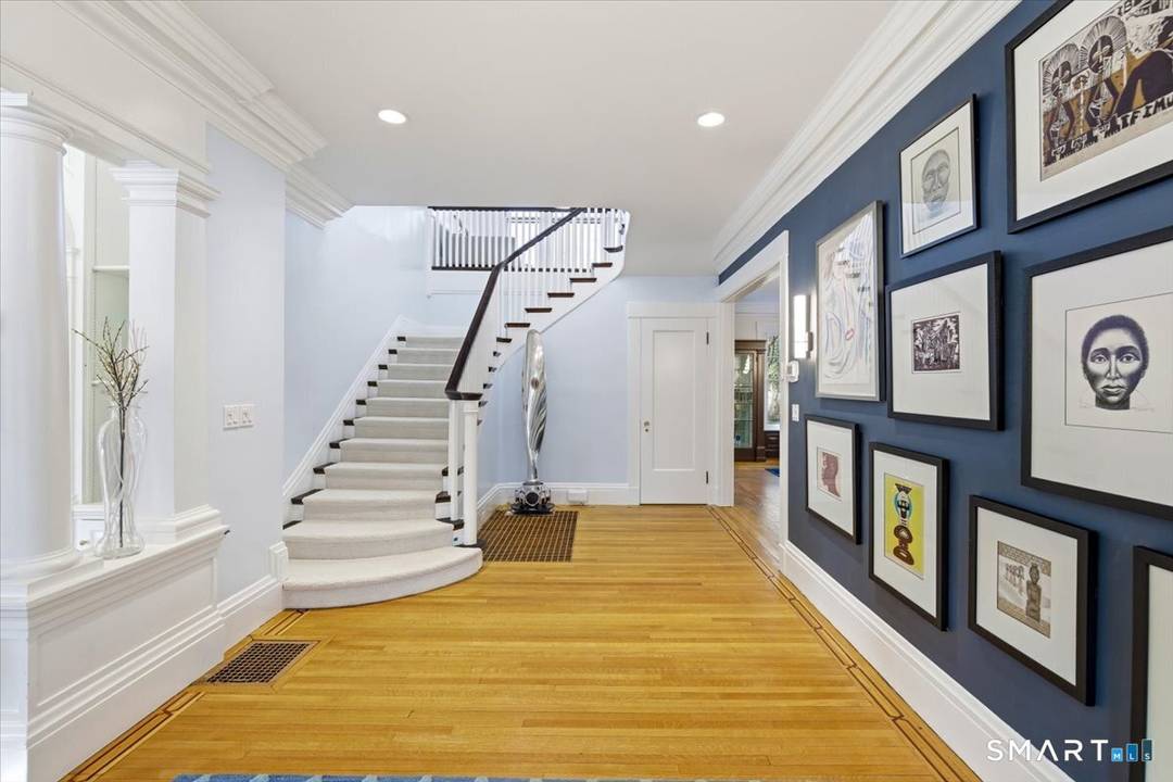 East Rock ! Directly across from Edgerton Park sits this elegant, beautifully proportioned, tastefully restored 1910 Colonial.