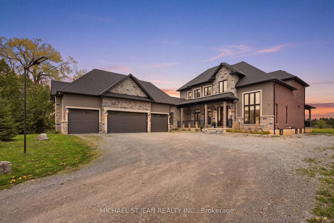 Experience the pinnacle of sophisticated rural luxury in this masterfully crafted 2022 custom built estate.