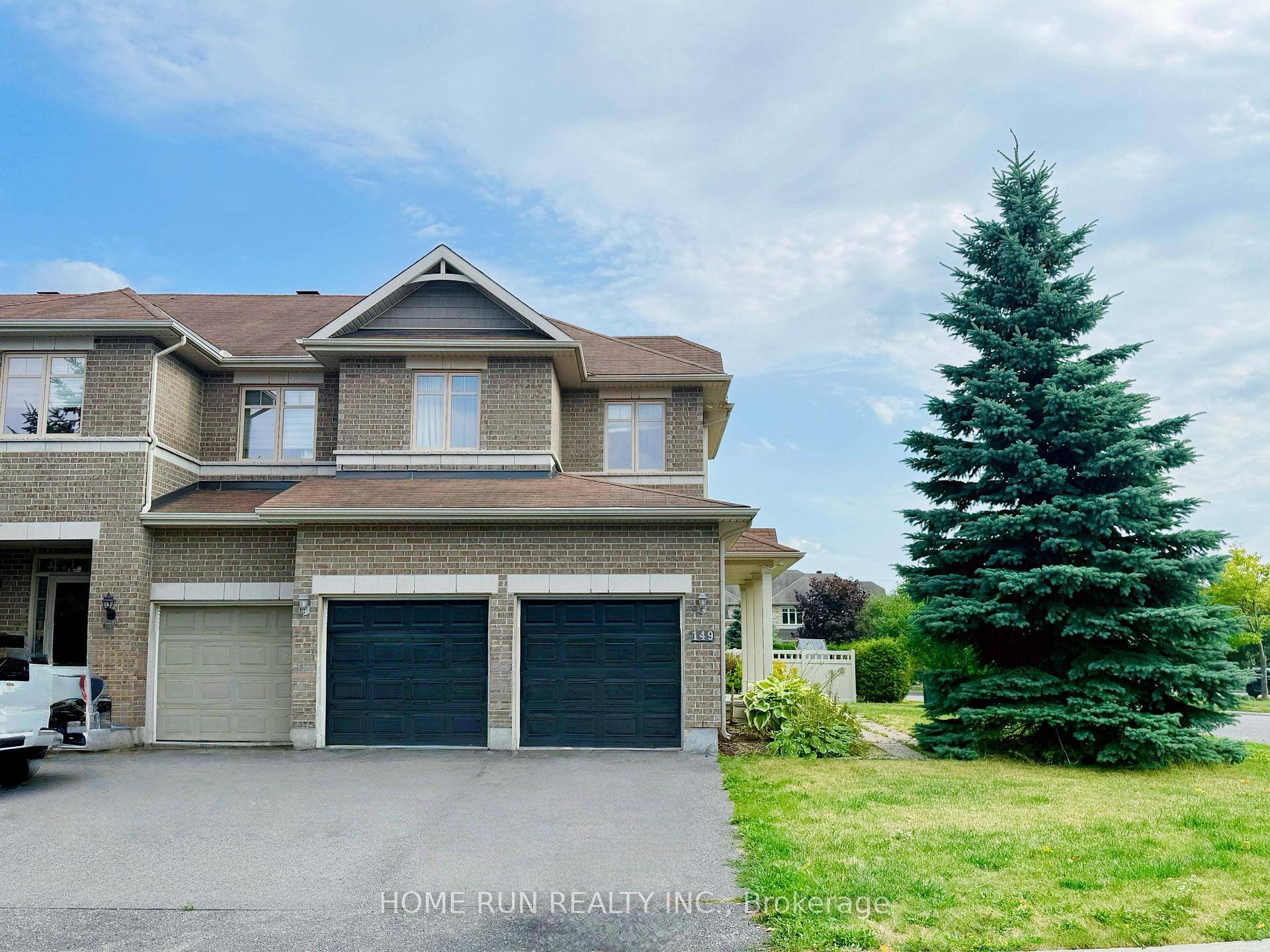 Available November 1, 2025 Rarely offered executive end unit freehold townhome with a double car garage, situated on an expansive irregular corner lot beside a serene forest area.