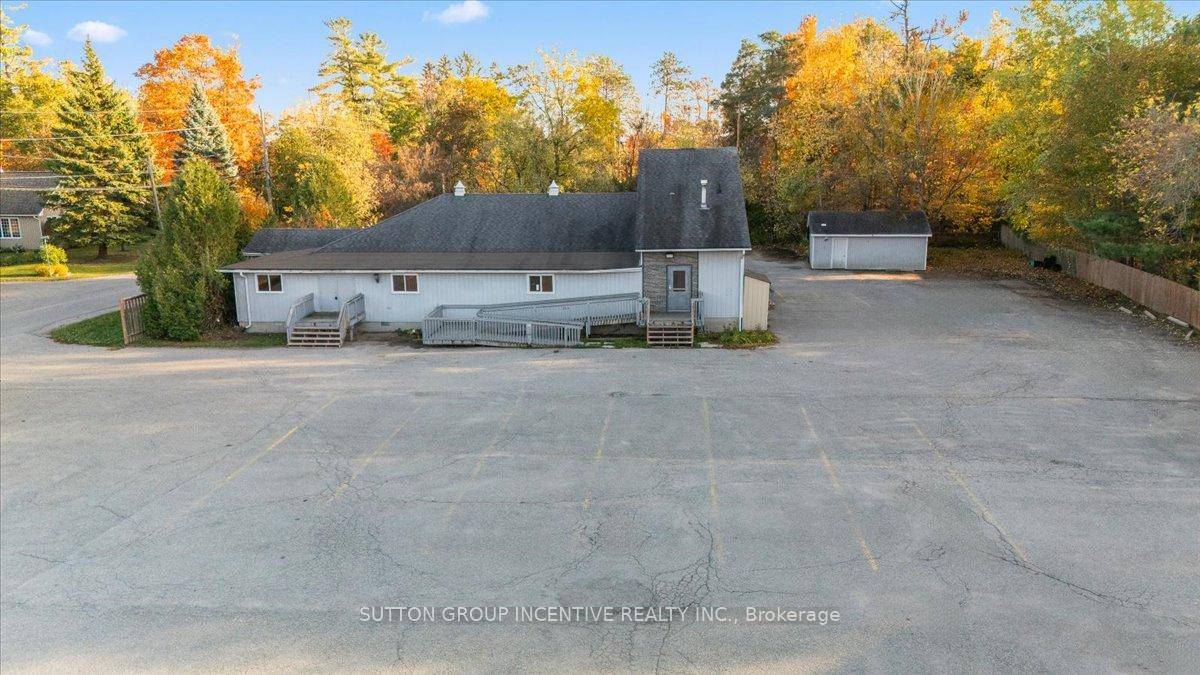 Discover this well maintained freestanding commercial building on 25th Sideroad, offering approximately 4, 000 sq.